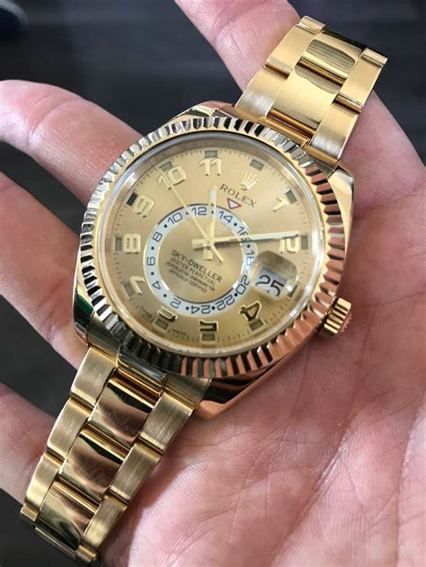 rolex sky dweller gold champagne dial|rolex sky dweller price used.